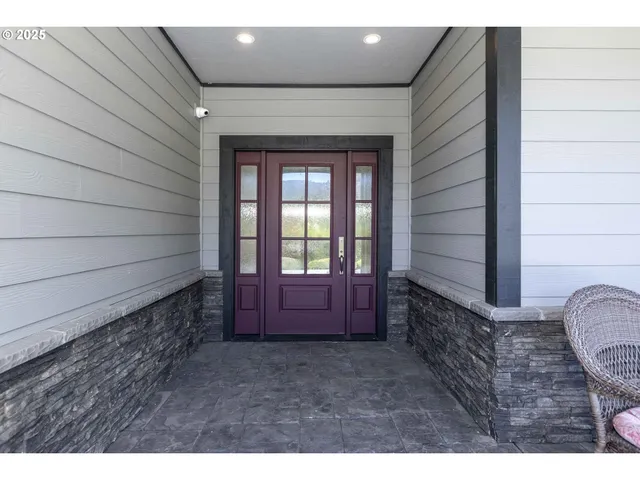a view of outdoor space and wooden floor