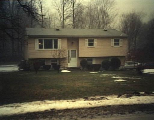 11 Oak Ridge Road Bethel, CT 06801 - Photo 1 of 1 a front view of a house with a yard