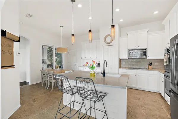 a view of backyard and trees