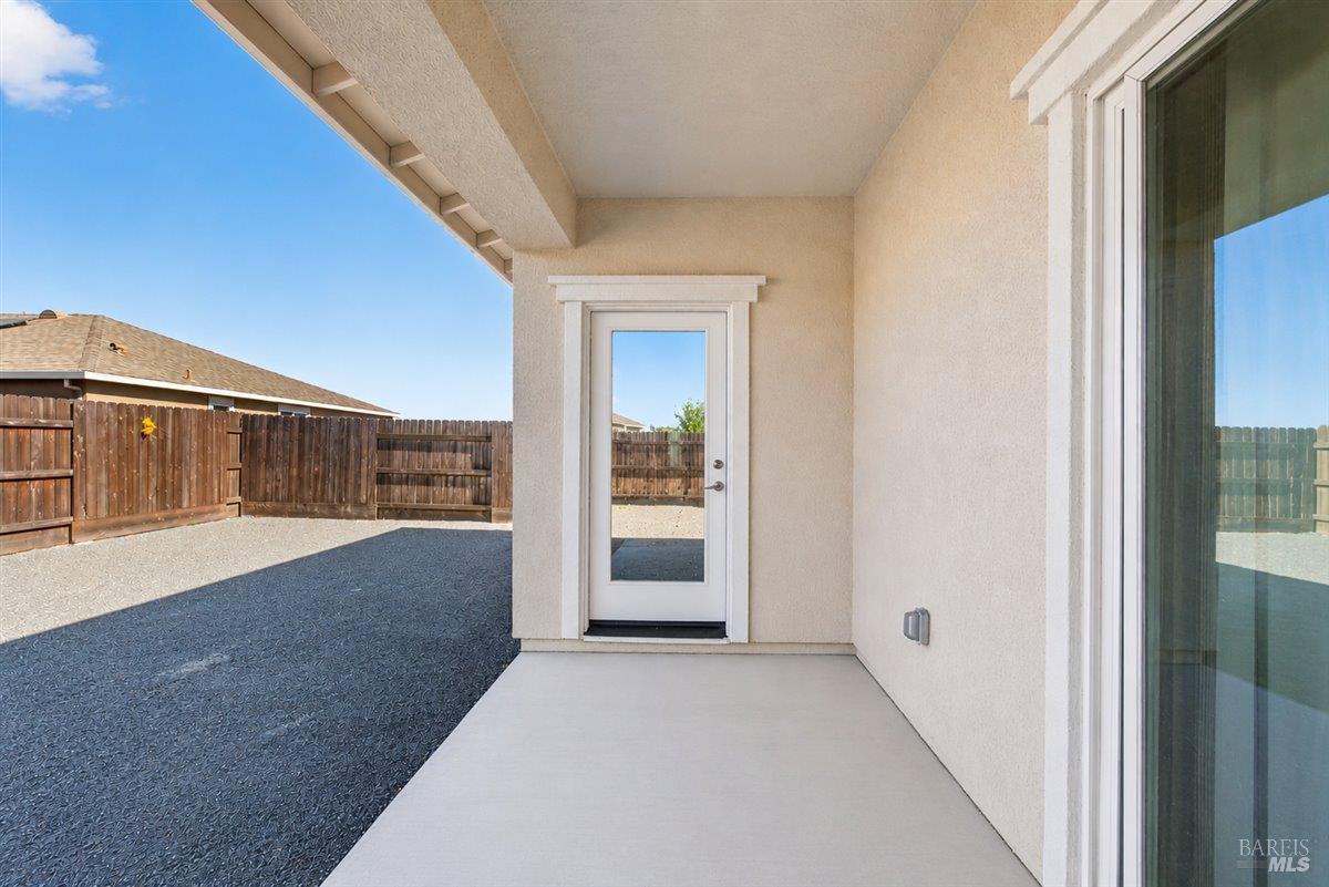 2275 Revival Lane Rio Vista, CA 94571 - Photo 27 of 31 a view of a hallway with wooden cabinet and a kitchen