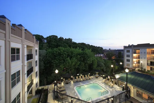 a terrace of a house with outdoor seating