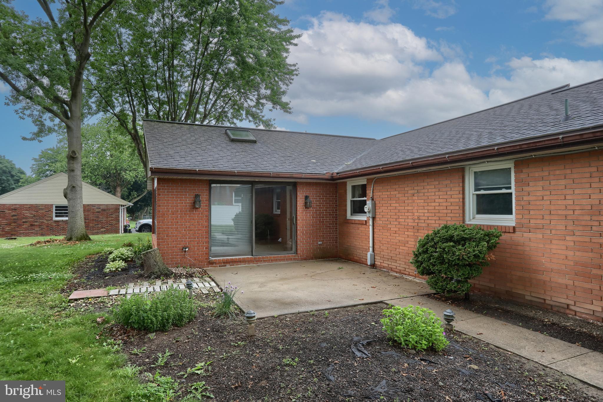 2040 Miller Road East Petersburg, PA 17520 - Photo 12 of 49 a front view of a house with garden