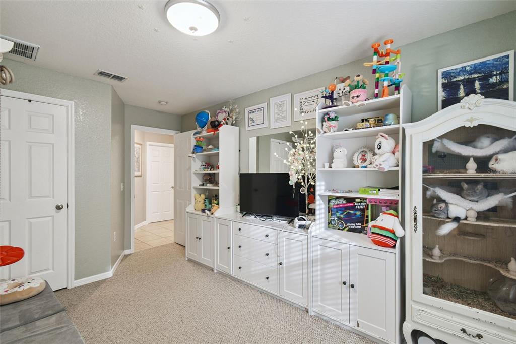 270 Planter Road Spring Hill, FL 34606 - Photo 21 of 33 a room with storage and utility