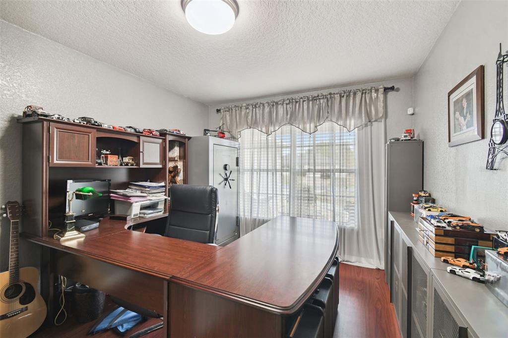 270 Planter Road Spring Hill, FL 34606 - Photo 23 of 33 a view of a workspace with furniture