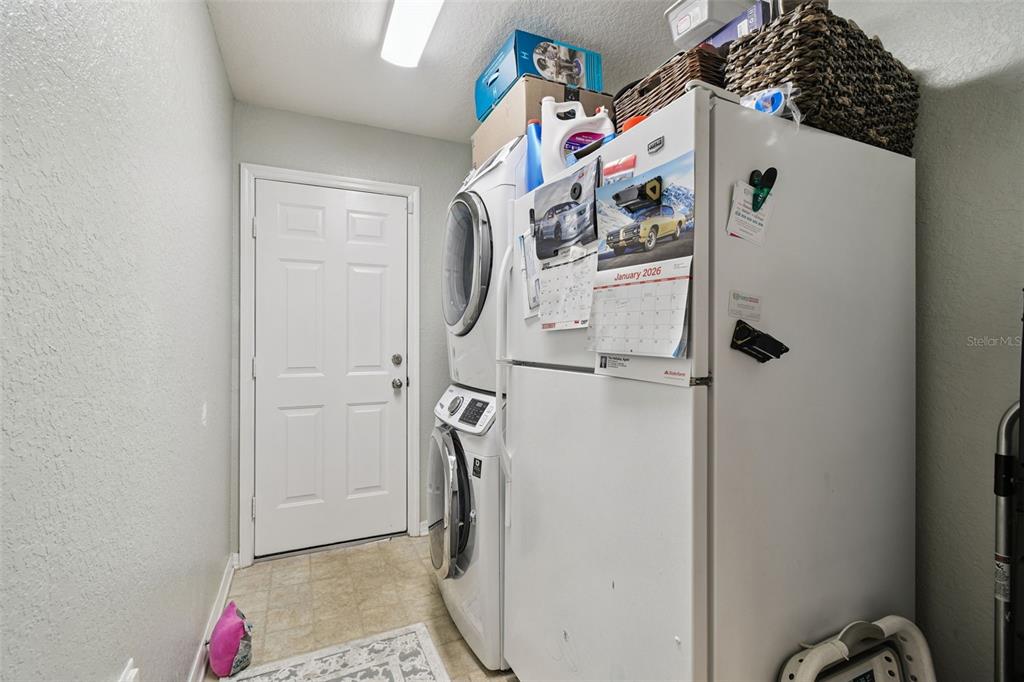 270 Planter Road Spring Hill, FL 34606 - Photo 24 of 33 a utility room with dryer and washer