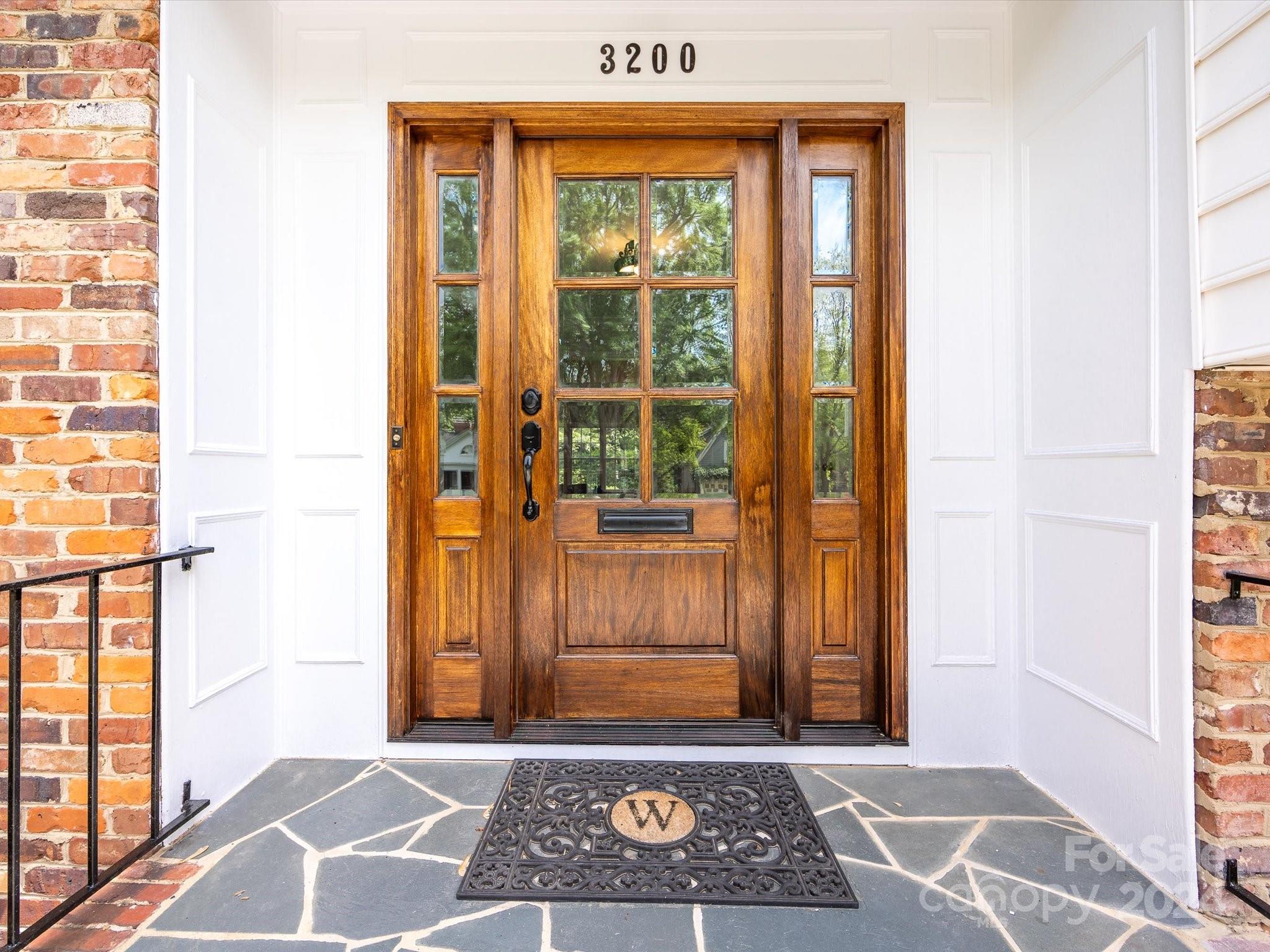 3200 Wickersham Road Charlotte, NC 28211 - Photo 2 of 35 a view of front door with wooden floor