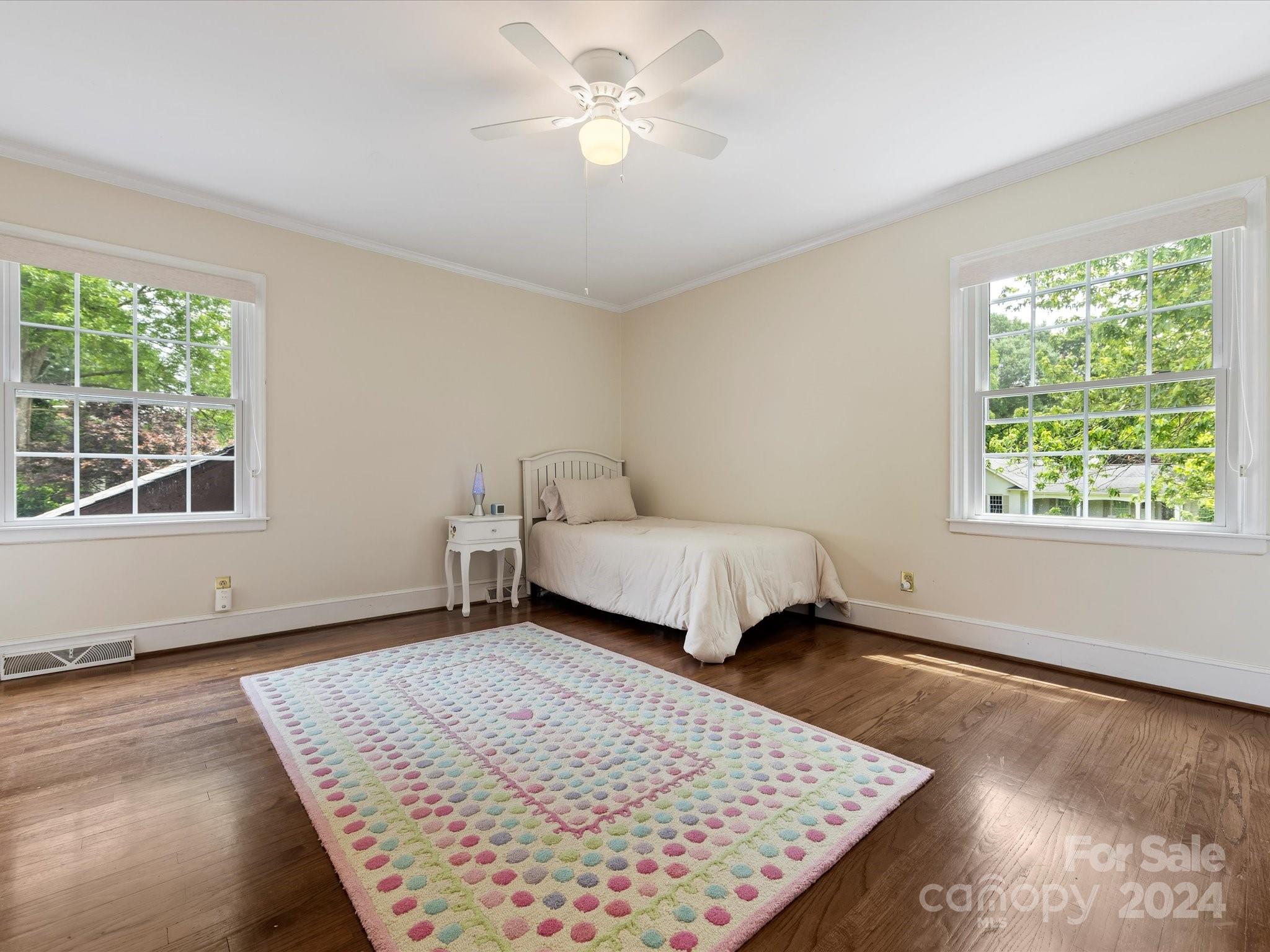3200 Wickersham Road Charlotte, NC 28211 - Photo 27 of 35 a bedroom with a bed and a window