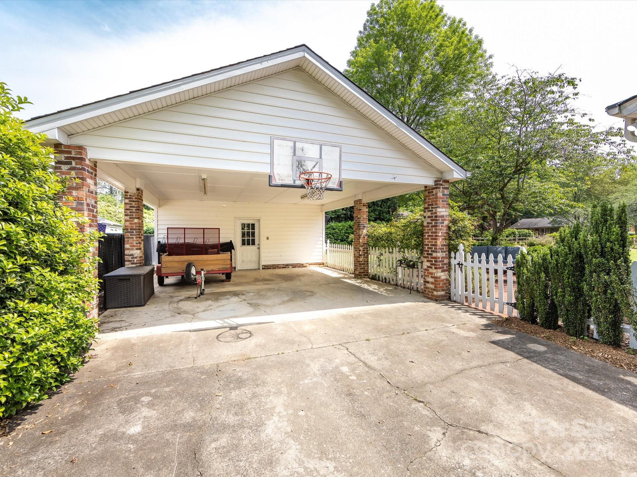 3200 Wickersham Road Charlotte, NC 28211 - Photo 30 of 35 a view of a house with a patio