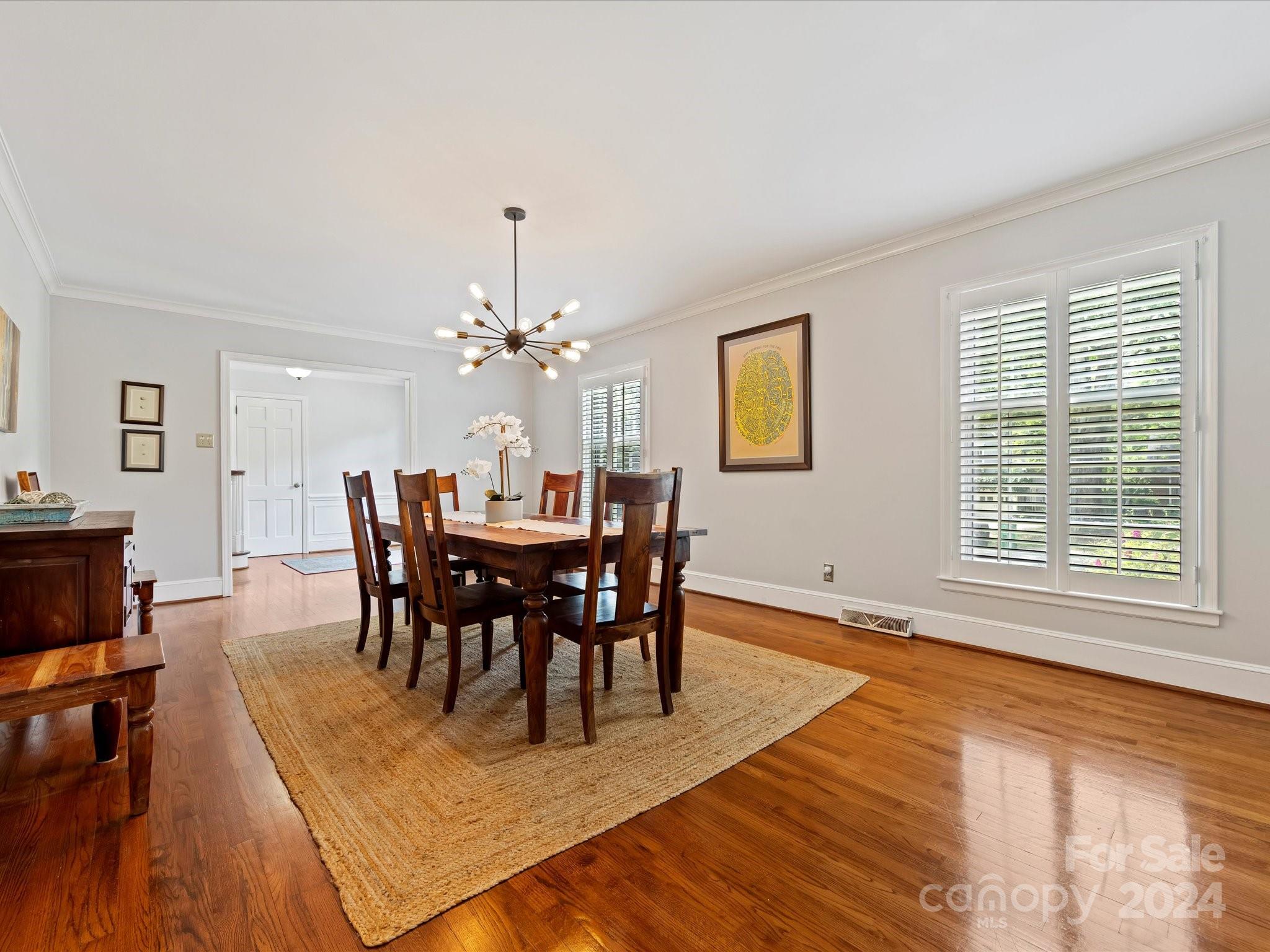 3200 Wickersham Road Charlotte, NC 28211 - Photo 5 of 35 a view of a dining room with furniture window and wooden floor