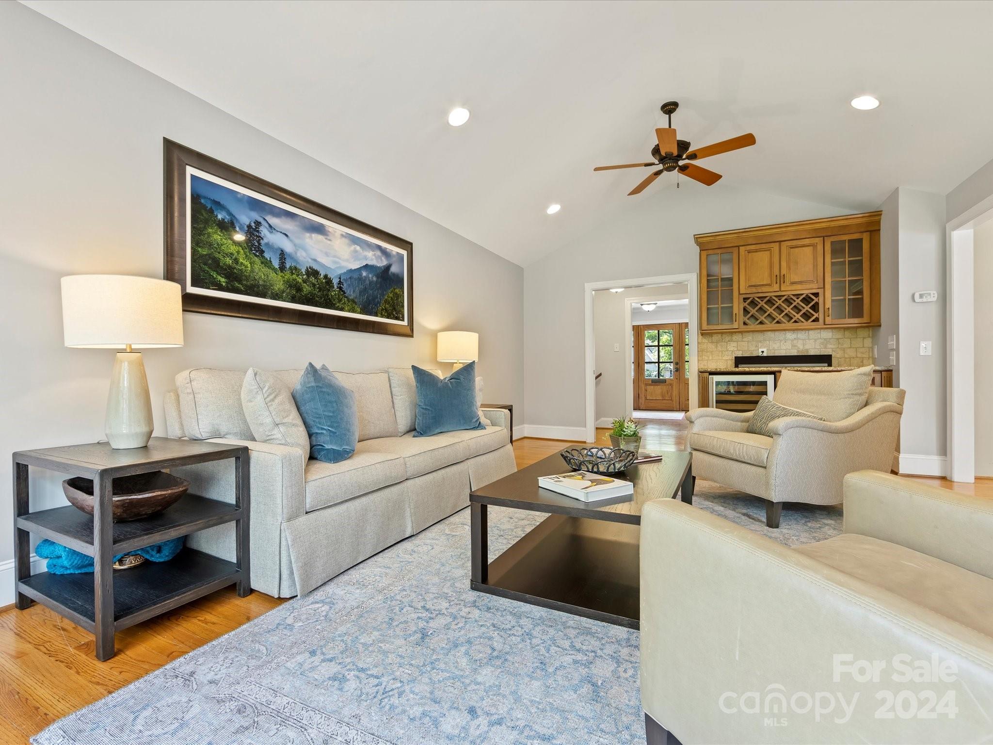 3200 Wickersham Road Charlotte, NC 28211 - Photo 8 of 35 a living room with furniture and a flat screen tv