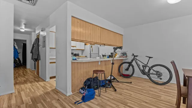 a view of entryway with wooden floor