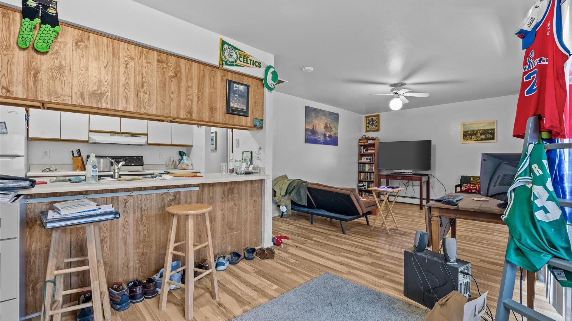 804 West Cedar Court Fruita, CO 81521 - Photo 24 of 40 a living room with furniture and a flat screen tv