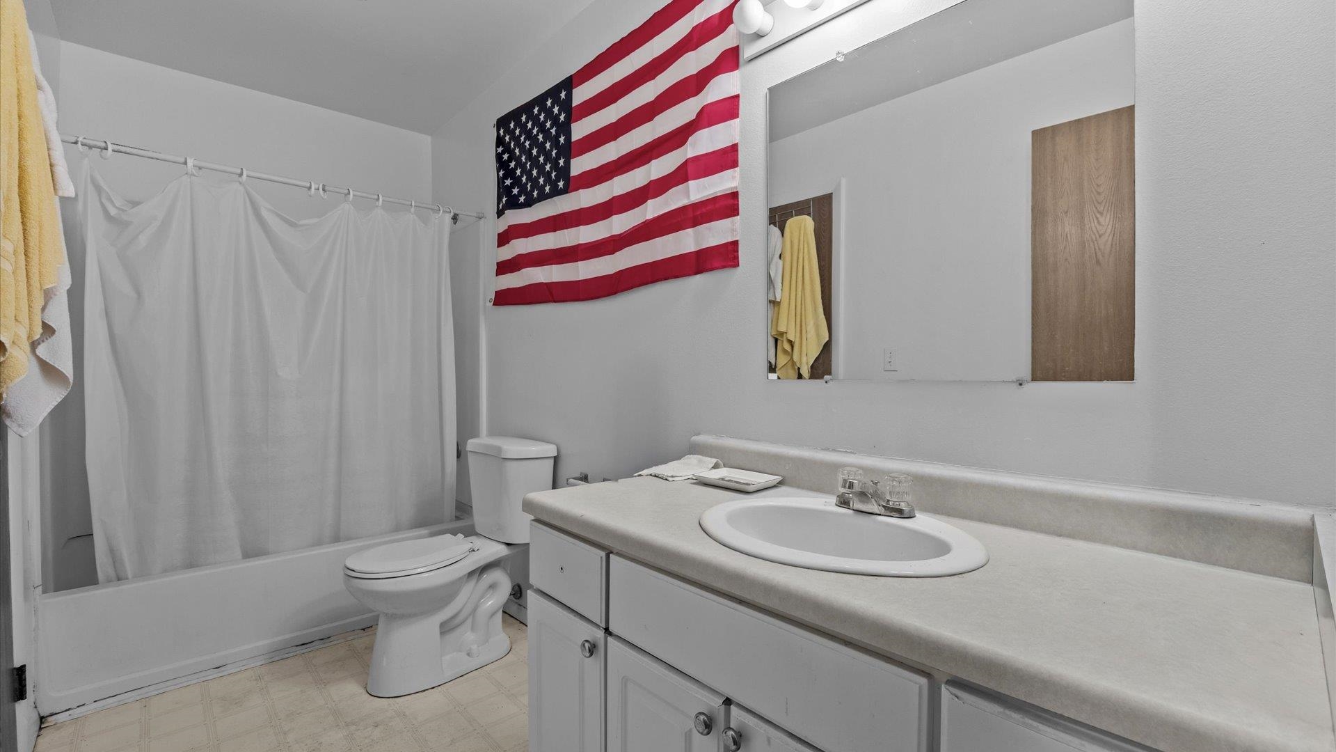 804 West Cedar Court Fruita, CO 81521 - Photo 25 of 40 a bathroom with a sink and a mirror