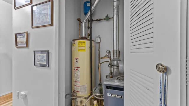a bathroom with a granite countertop shower and a sink