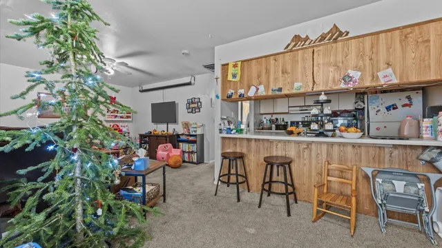 a outdoor dining space with furniture and a potted plant