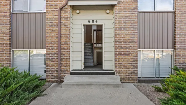 a front view of a house with a door