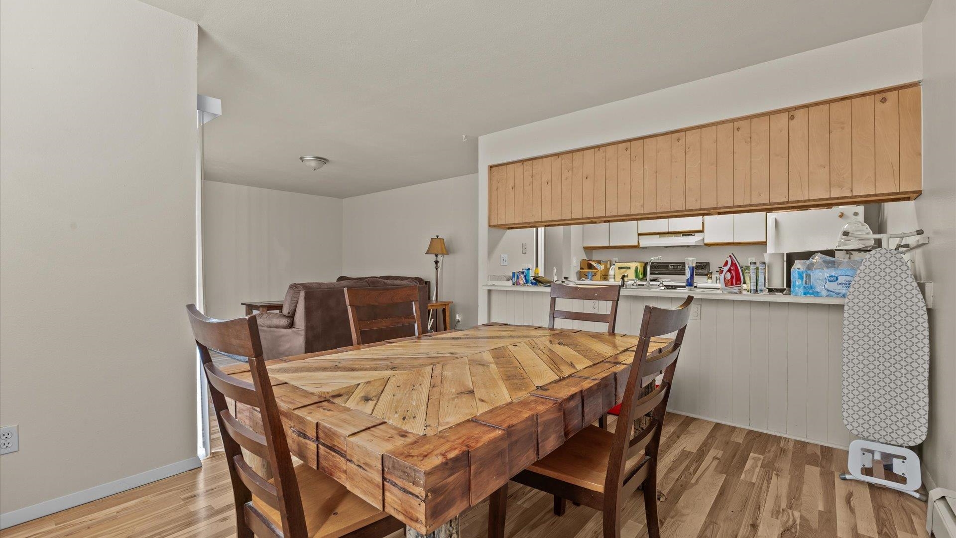804 West Cedar Court Fruita, CO 81521 - Photo 9 of 40 a dining room with furniture and a book shelf