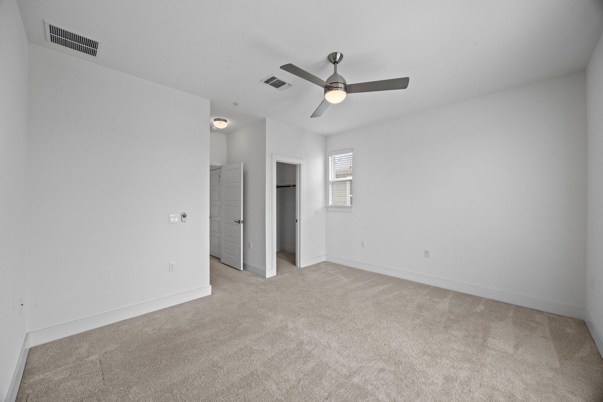 2222 Simond Avenue, Unit E Austin, TX 78723 - Photo 23 of 28 The secondary bedrooms are good sizes.