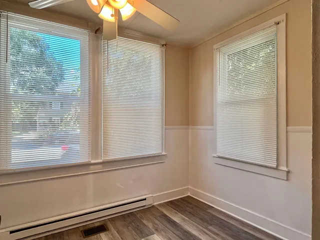 a view of a room that has a window