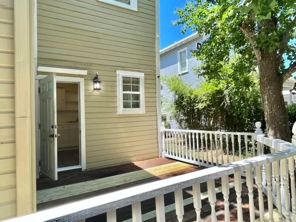 a view of a backyard with a deck