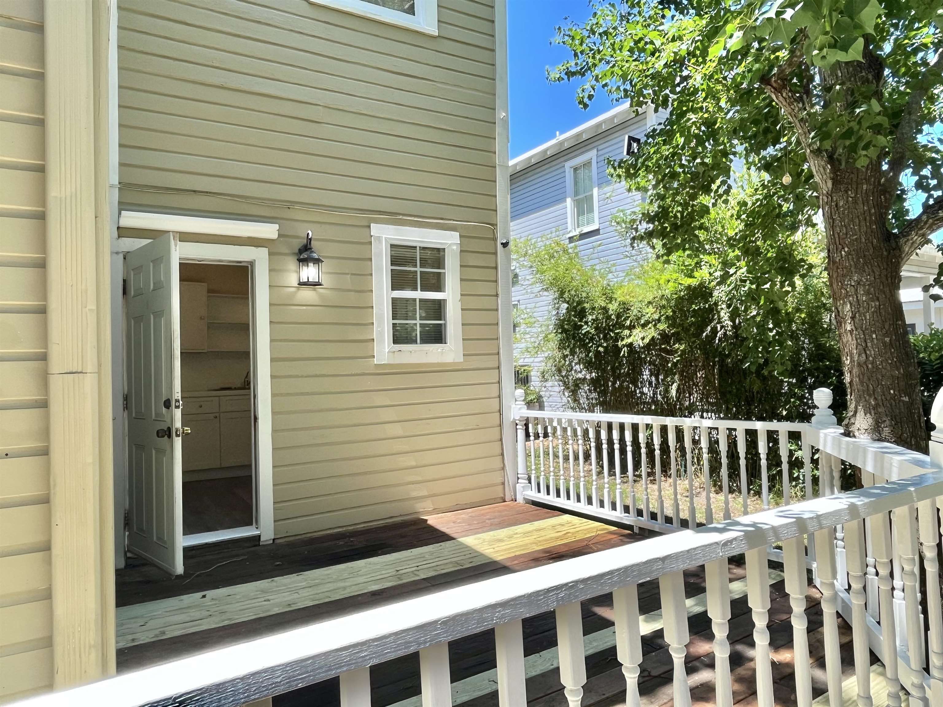 25 Desoto Place, Unit 1 St. Augustine, FL 32084 - Photo 10 of 12 a view of a backyard with a deck