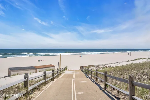 a view of a balcony with an ocean view