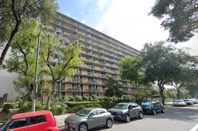 a view of a street with houses