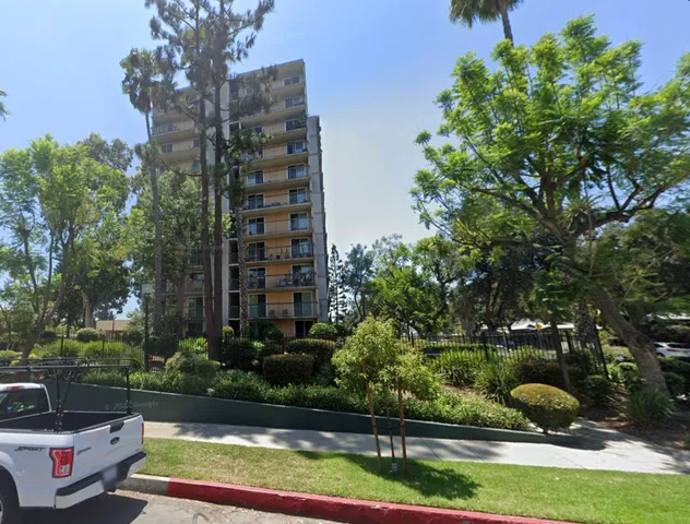 a view of a city with tall buildings