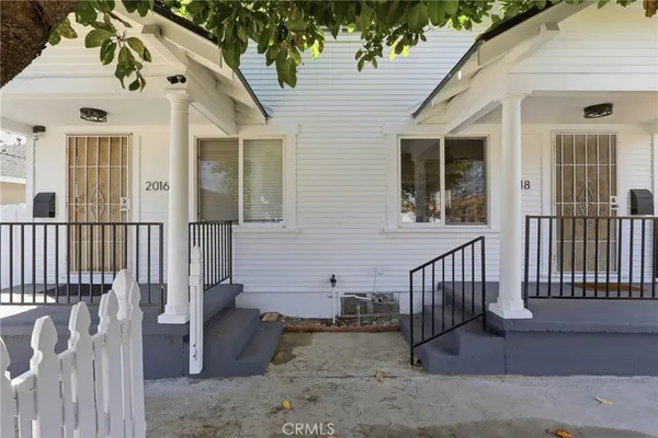 a view of a house with a porch