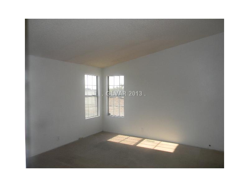 2280 North Leighton Road Pahrump, NV 89060 - Photo 13 of 24 Master Bedroom.