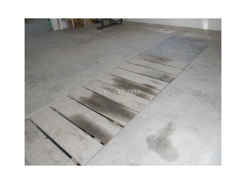2280 North Leighton Road Pahrump, NV 89060 - Photo 21 of 24 Other. IN GROUND OIL PIT IN GARAGE