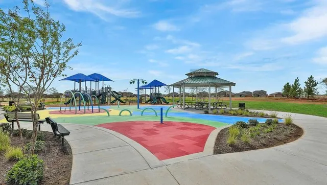 a view of a park with a slide