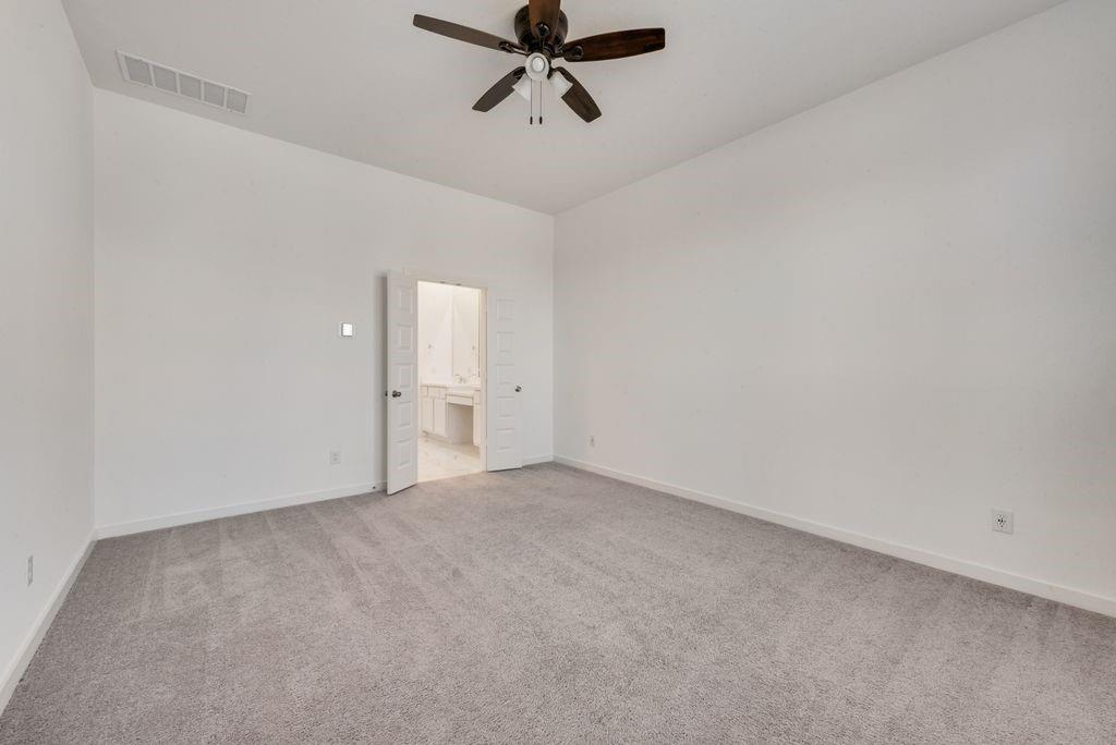 7001 Spring Park Drive Little Elm, TX 76227 - Photo 22 of 38 a view of an empty room