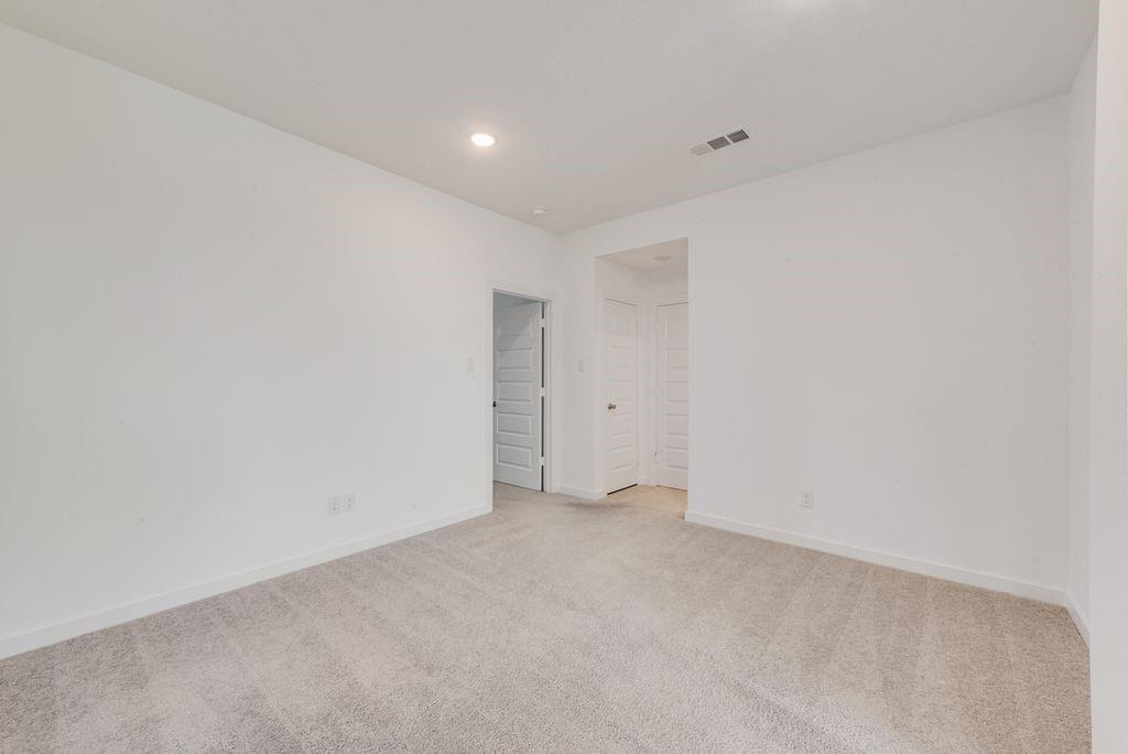 7001 Spring Park Drive Little Elm, TX 76227 - Photo 28 of 38 a view of an empty room