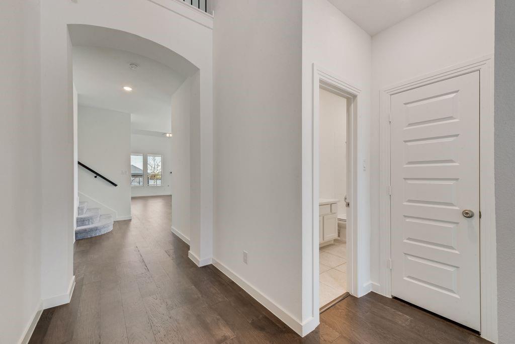 7001 Spring Park Drive Little Elm, TX 76227 - Photo 6 of 38 a view of entryway with wooden floor