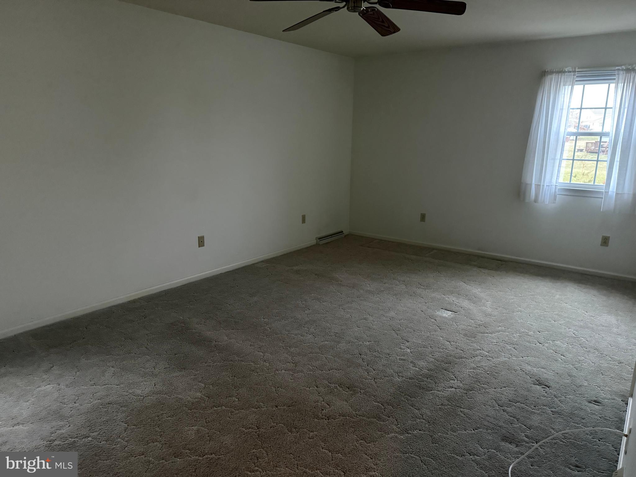 340 Estate Road Boyertown, PA 19512 - Photo 11 of 16 an empty room with a window