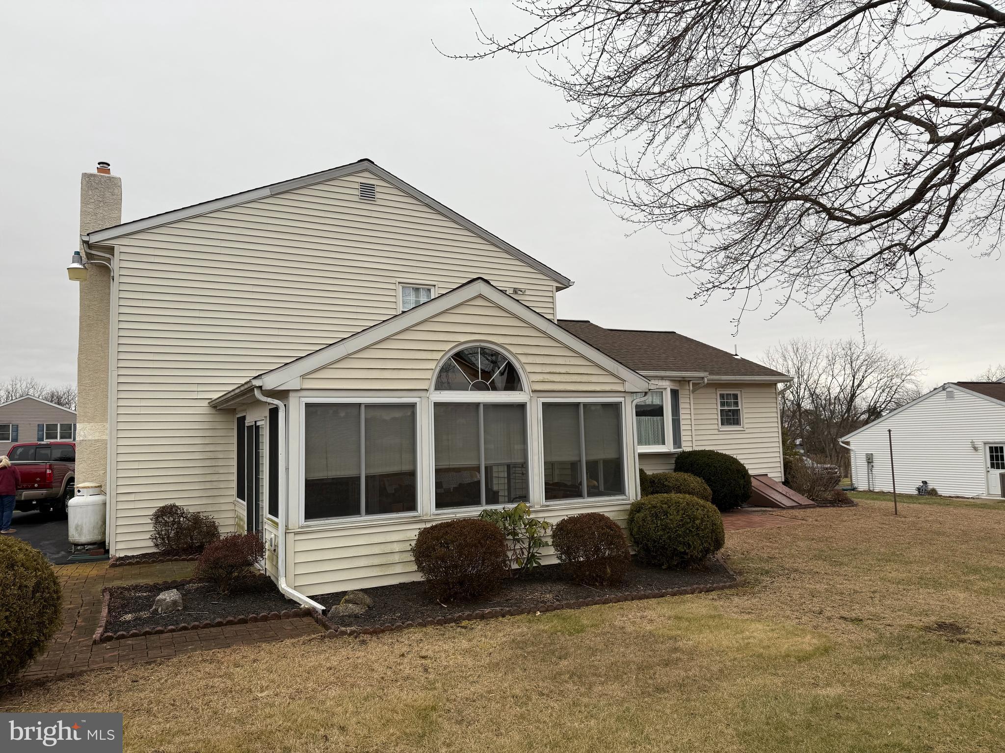 340 Estate Road Boyertown, PA 19512 - Photo 2 of 16 a view of a house with a large window and a yard