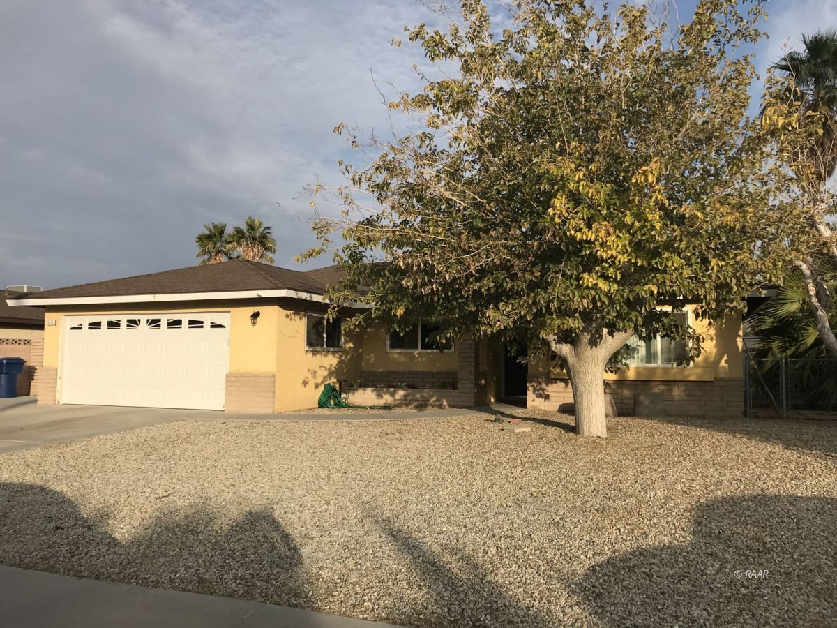 508 Randall Street Ridgecrest, CA 93555 - Photo 1 of 1 a front view of a house with a yard