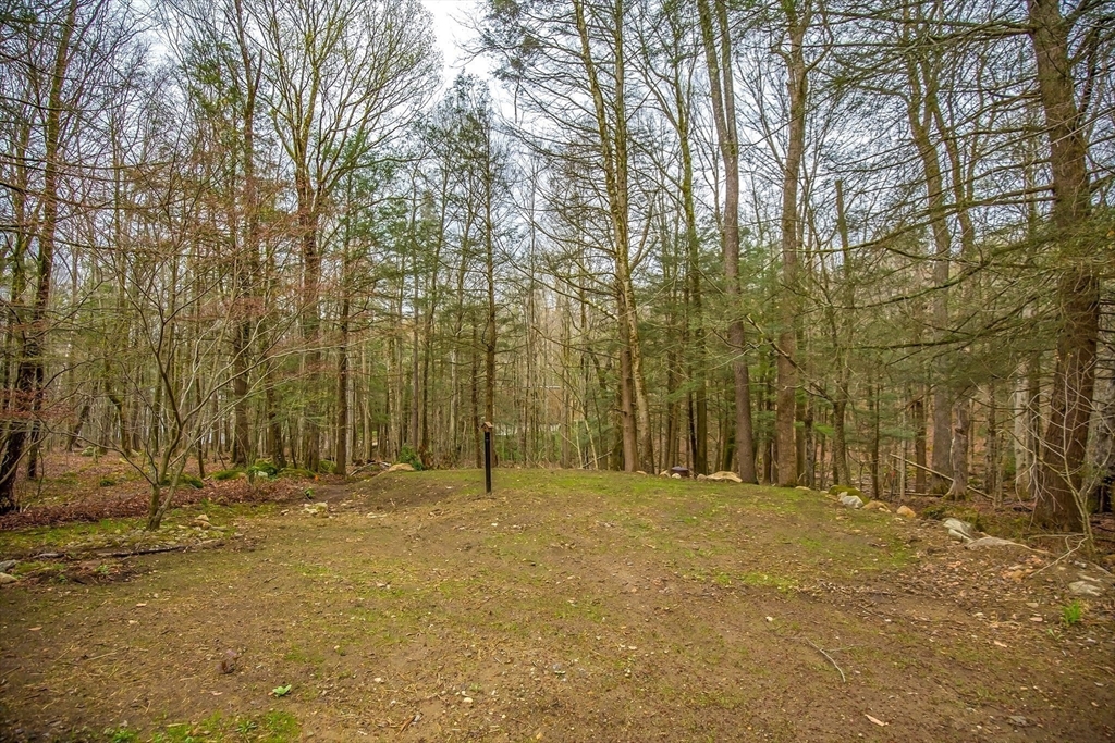 32 Woodchuck Hollow Road Tolland, MA 01034 - Photo 33 of 41 a view of outdoor space with trees