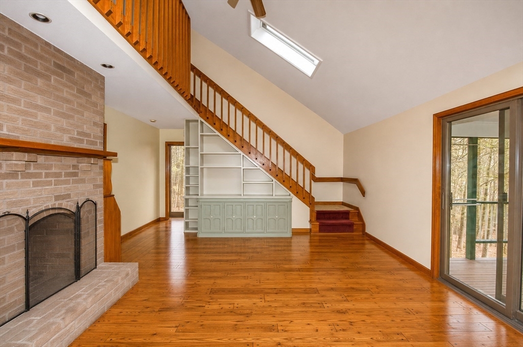 32 Woodchuck Hollow Road Tolland, MA 01034 - Photo 7 of 41 a view of entryway and hall with wooden floor