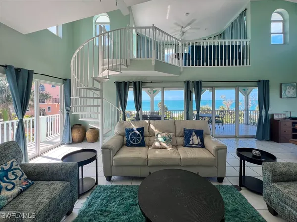 a view of a livingroom with furniture and window