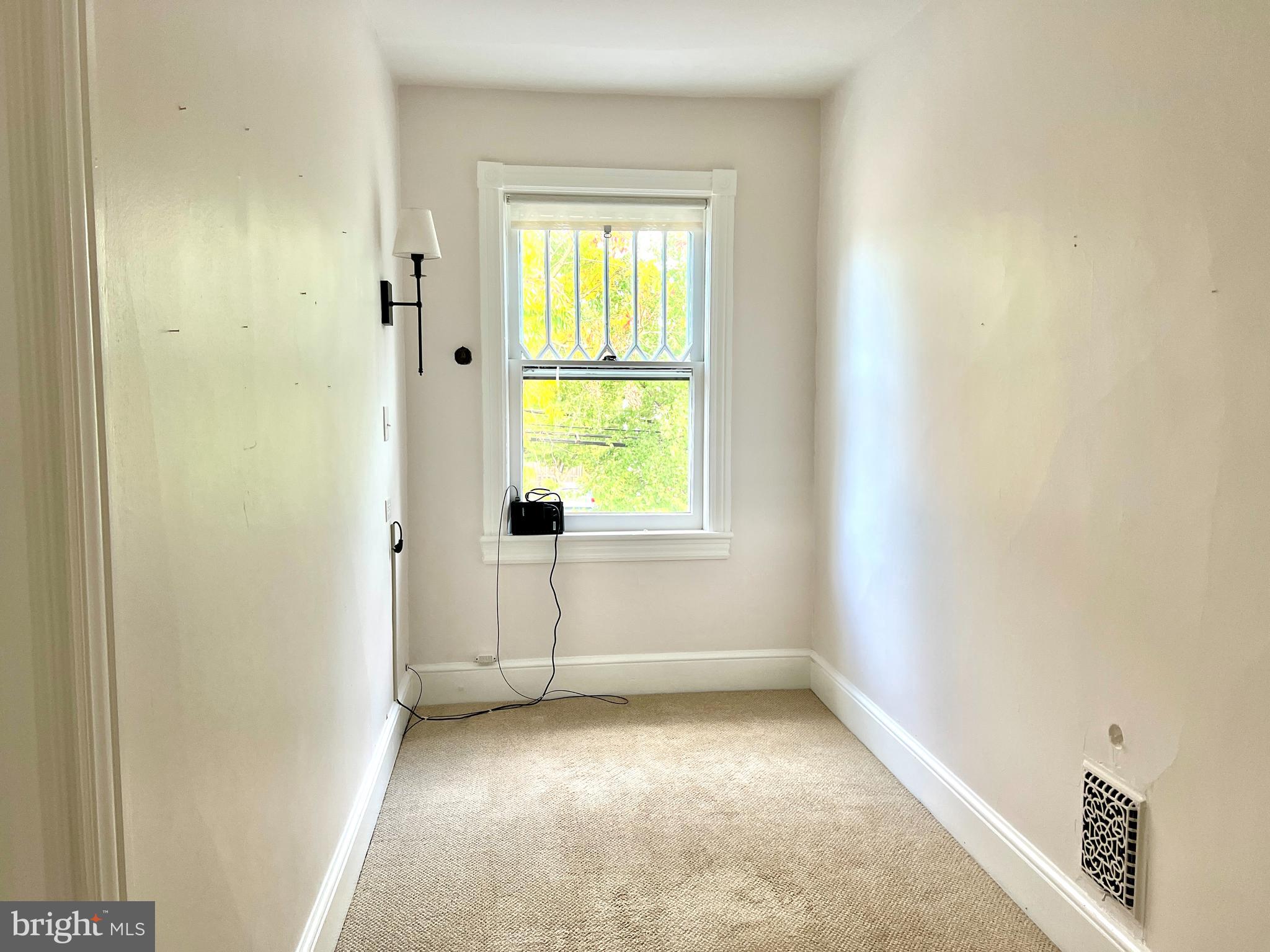 38 Walnut Street Haddonfield, NJ 08033 - Photo 10 of 14 an empty room with windows
