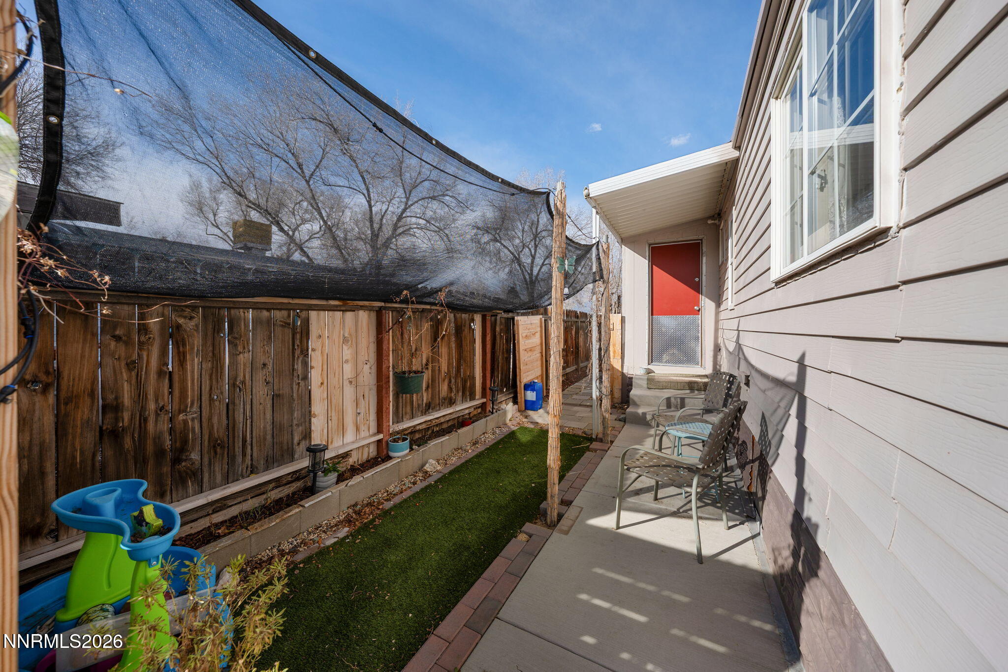 220 Aristocrat Way Reno, NV 89506 - Photo 11 of 35 a backyard of a house with outdoor seating