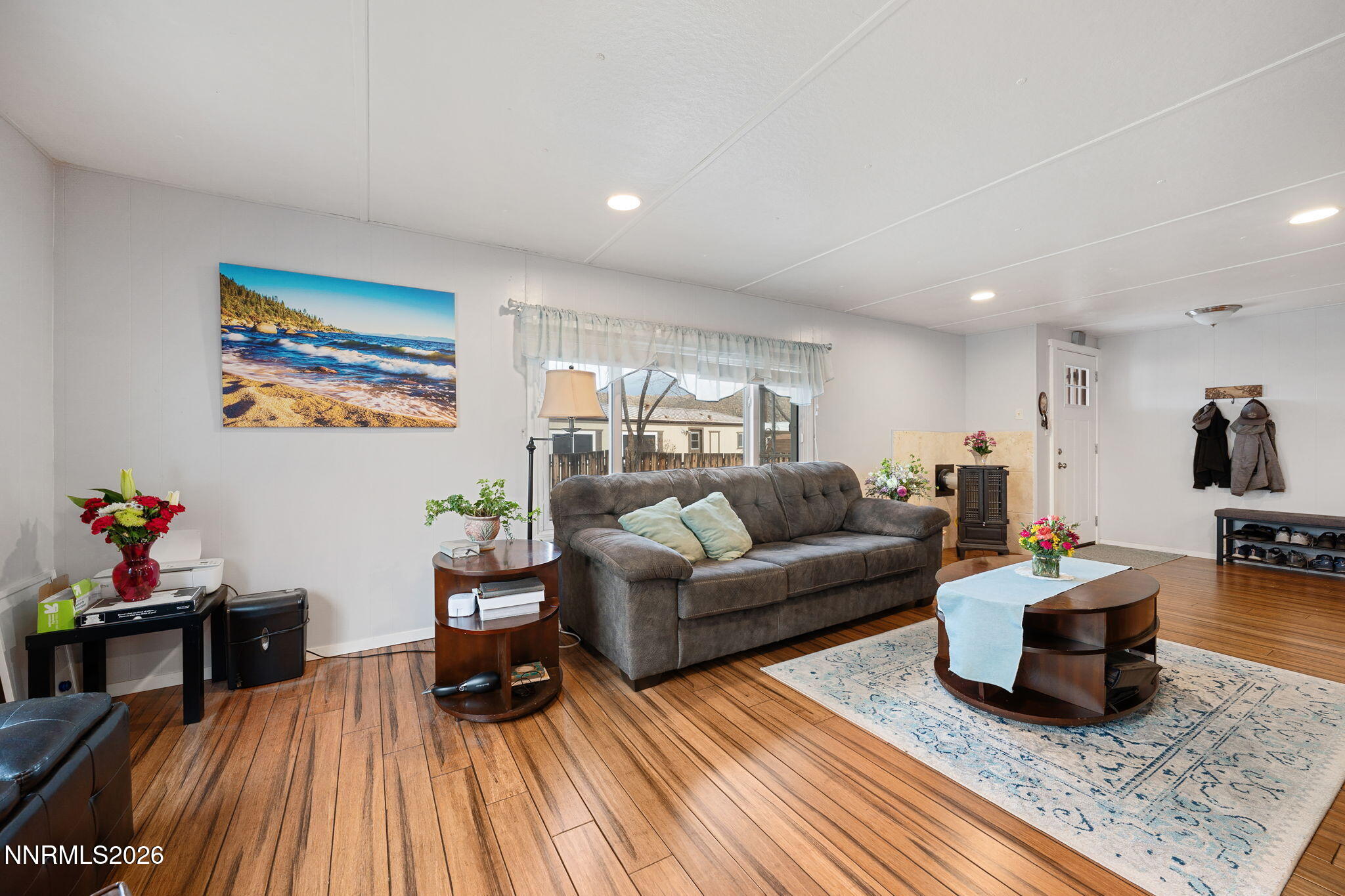 220 Aristocrat Way Reno, NV 89506 - Photo 2 of 35 a living room with furniture and wooden floor