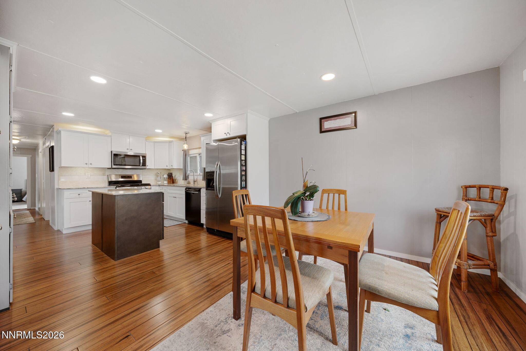 220 Aristocrat Way Reno, NV 89506 - Photo 23 of 35 a view of kitchen with furniture and wooden floor