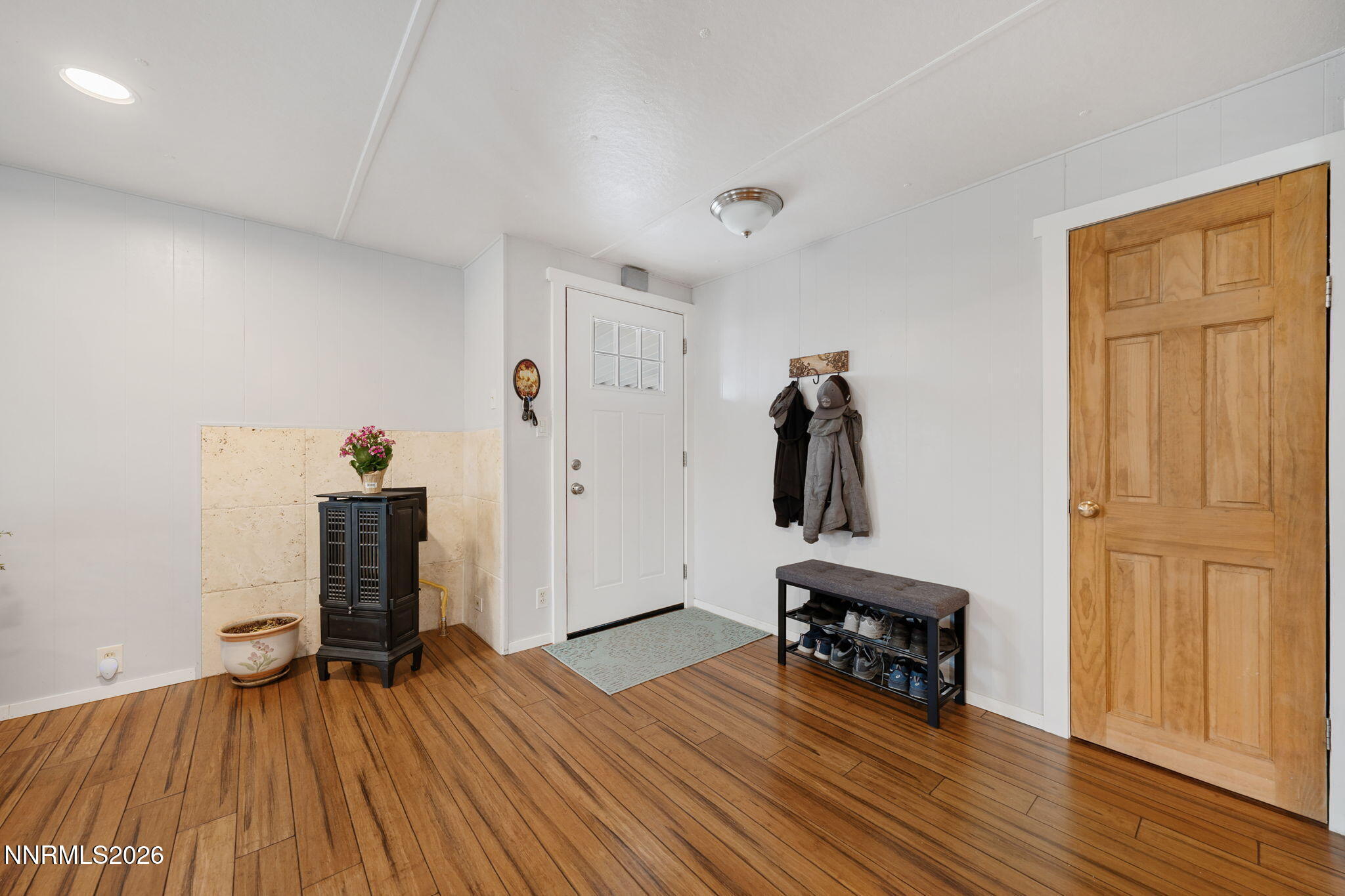 220 Aristocrat Way Reno, NV 89506 - Photo 26 of 35 a view of empty room with wooden floor and furniture