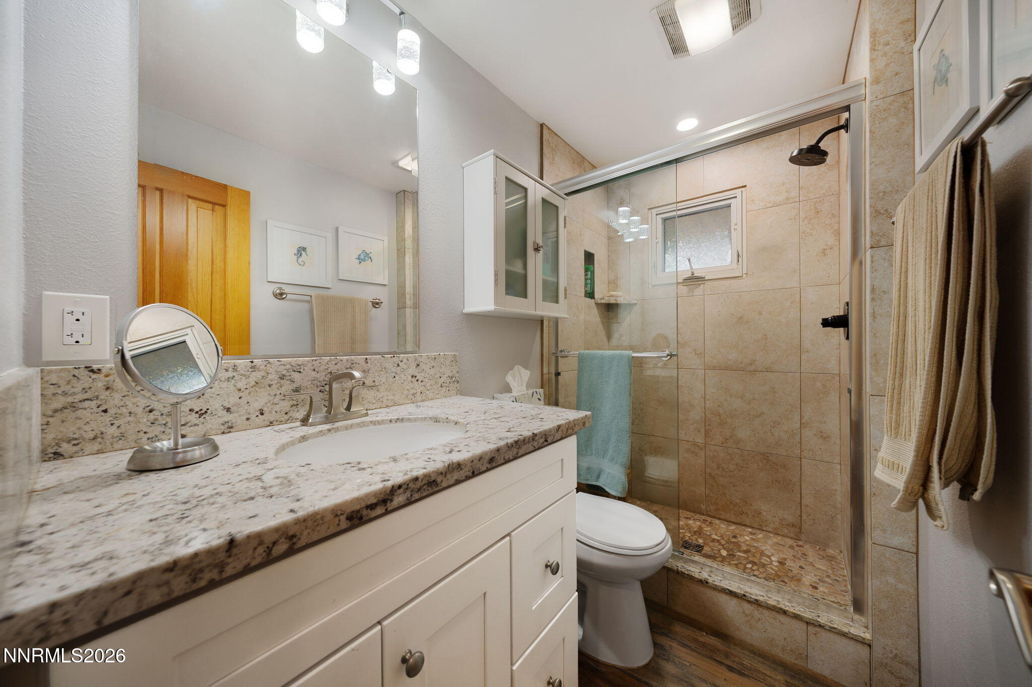 220 Aristocrat Way Reno, NV 89506 - Photo 28 of 35 a bathroom with a granite countertop sink toilet and shower