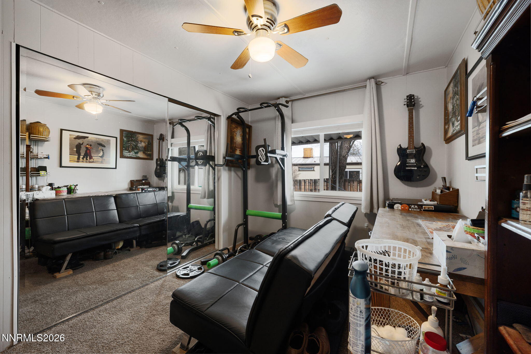 220 Aristocrat Way Reno, NV 89506 - Photo 29 of 35 a living room with furniture and a flat screen tv
