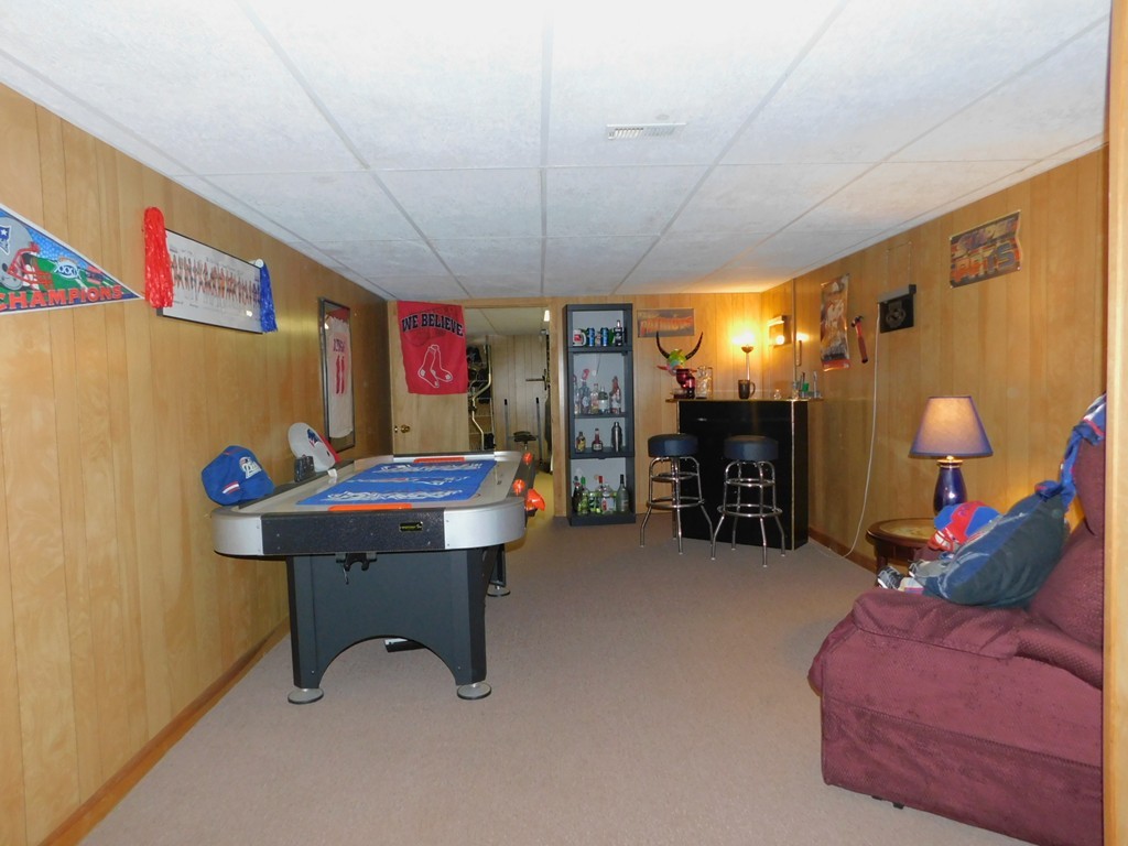 96 Laurence Street Springfield, MA 01104 - Photo 13 of 21 a living room with furniture and a pool table