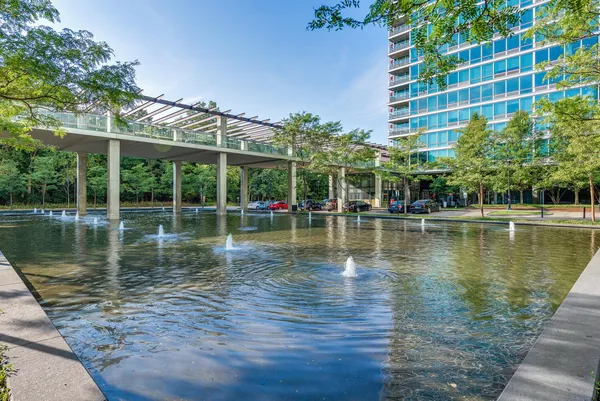 a view of a swimming pool with a lake view